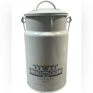 Beekman 1802 collectible milk pail. The design has a vintage, dairy-themed look.